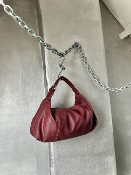 Vintage leather handbag with buckle strap wine red