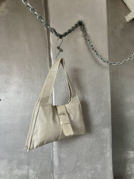 Vintage real leather shoulderbag with buckle strap creme