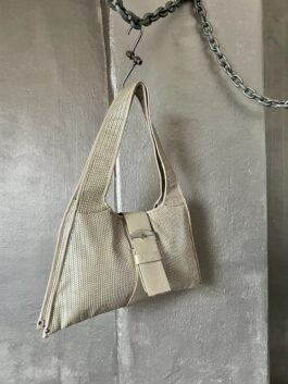 Vintage real leather shoulderbag with buckle strap creme