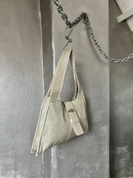 Vintage real leather shoulderbag with buckle strap creme