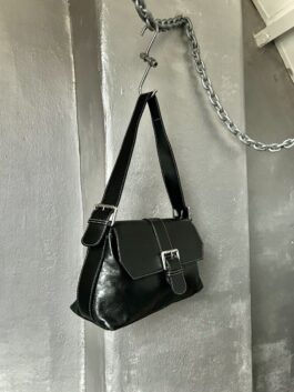 Vintage real leather shoulderbag with buckle straps black