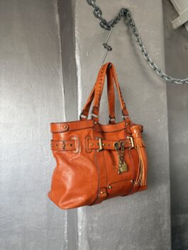 Vintage real leather shoulderbag with bronze hardware orange