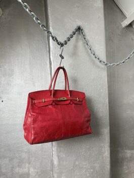 Vintage real leather handbag with bronze hardware red